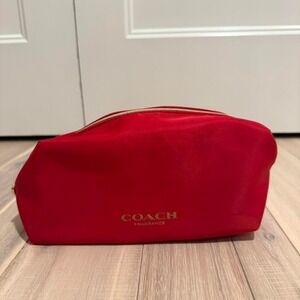 Coach red makeup bag with gold heart charm